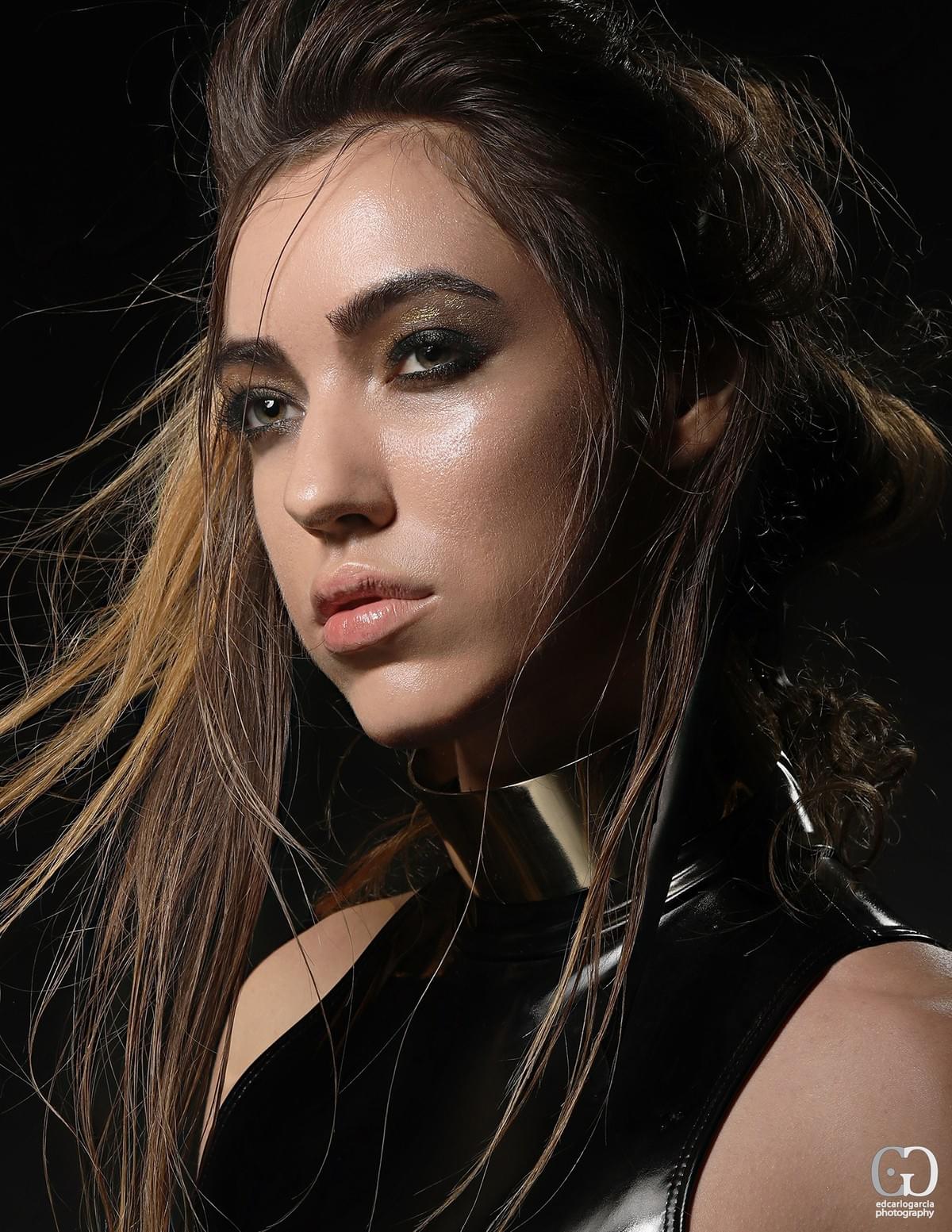 Beauty portrait in black mesh styling