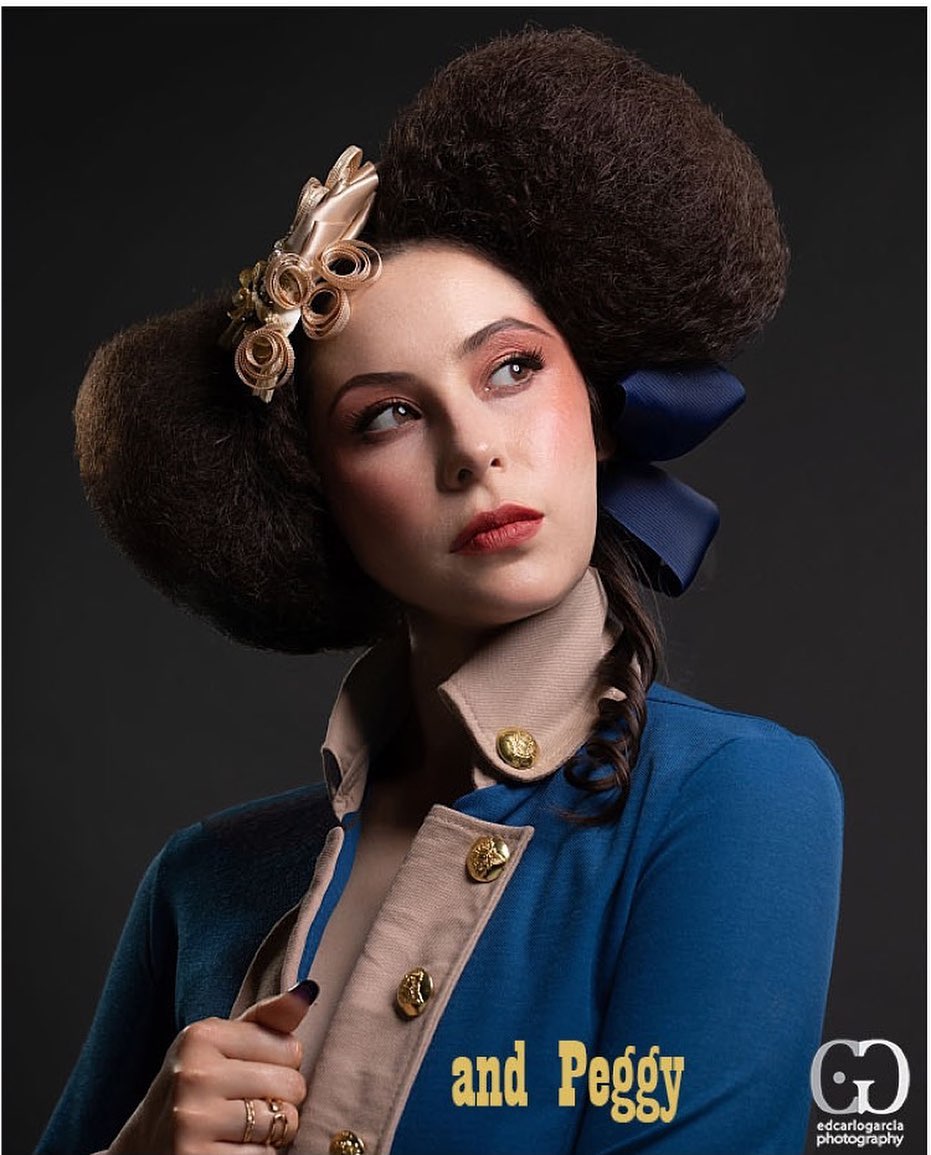 Beauty editorial portrait with sculptural hair and soft makeup