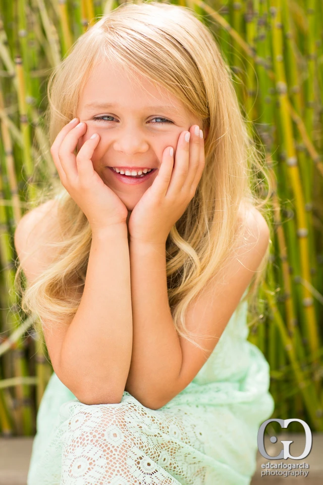 Young model portrait in a mint dress